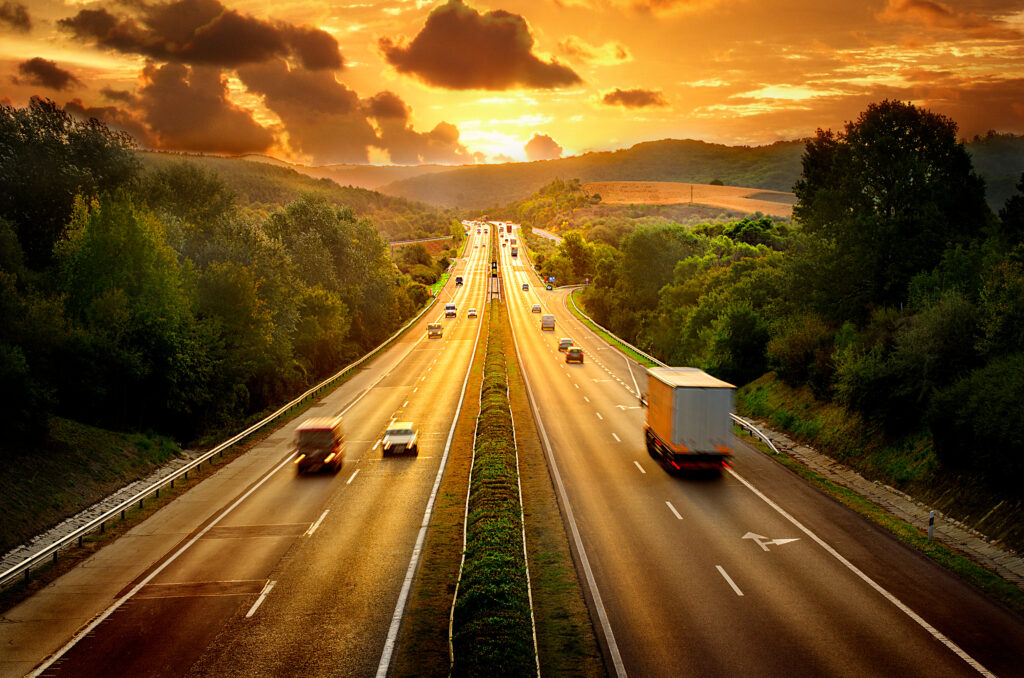 Highway traffic in sunset